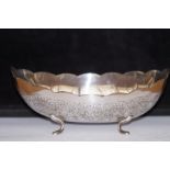 Silver four footed oval dish 19 cm wide