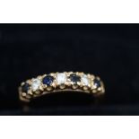 9ct Gold ring set with 4 blue stones