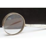 Silver magnifying glass