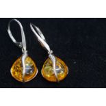 Pair of silver & amber earrings with certificate