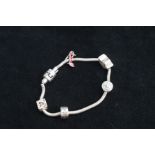Silver charm bracelet with 5 charms