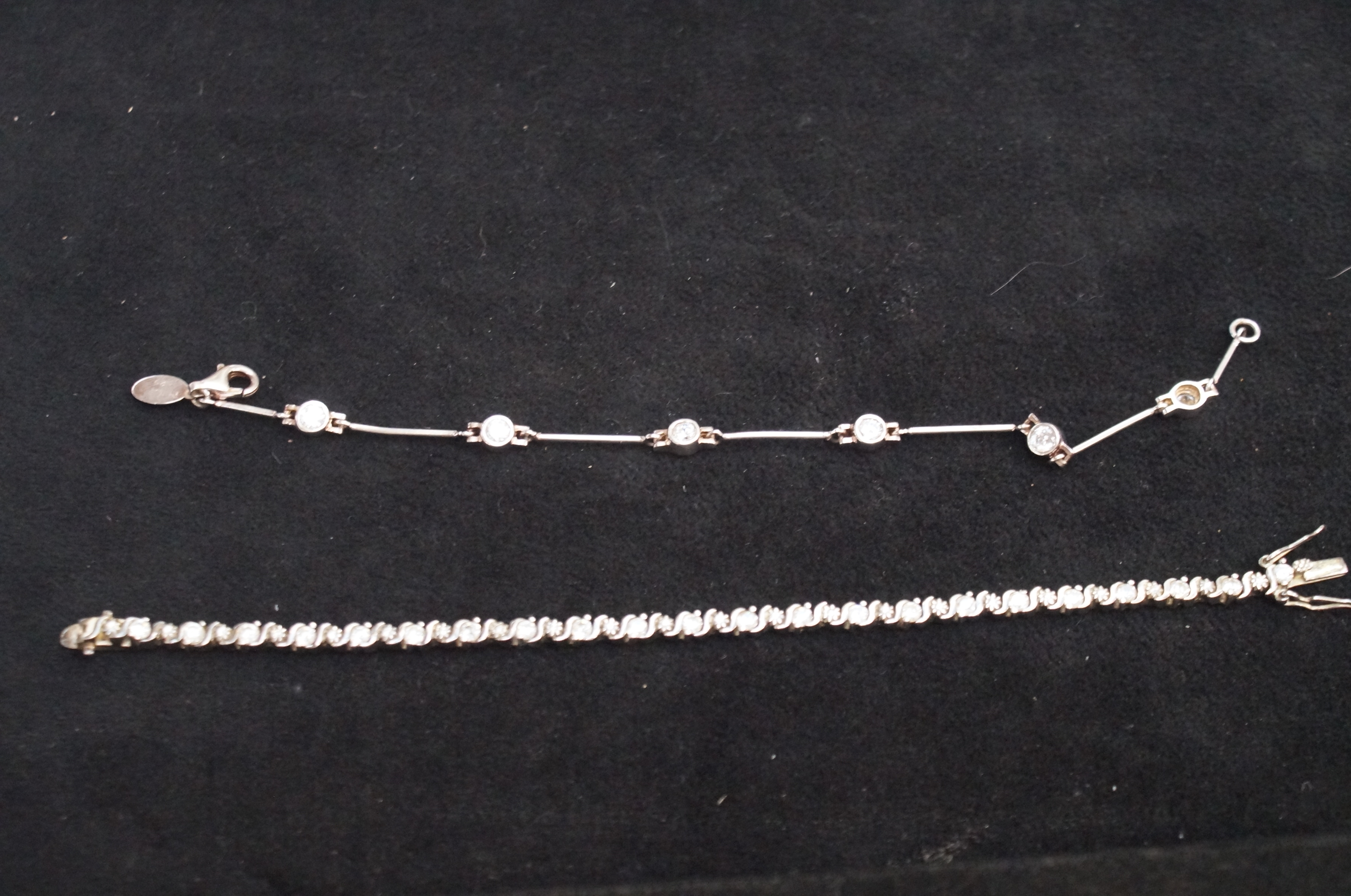 1 Silver & 1 white metal tennis bracelet