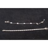 1 Silver & 1 white metal tennis bracelet