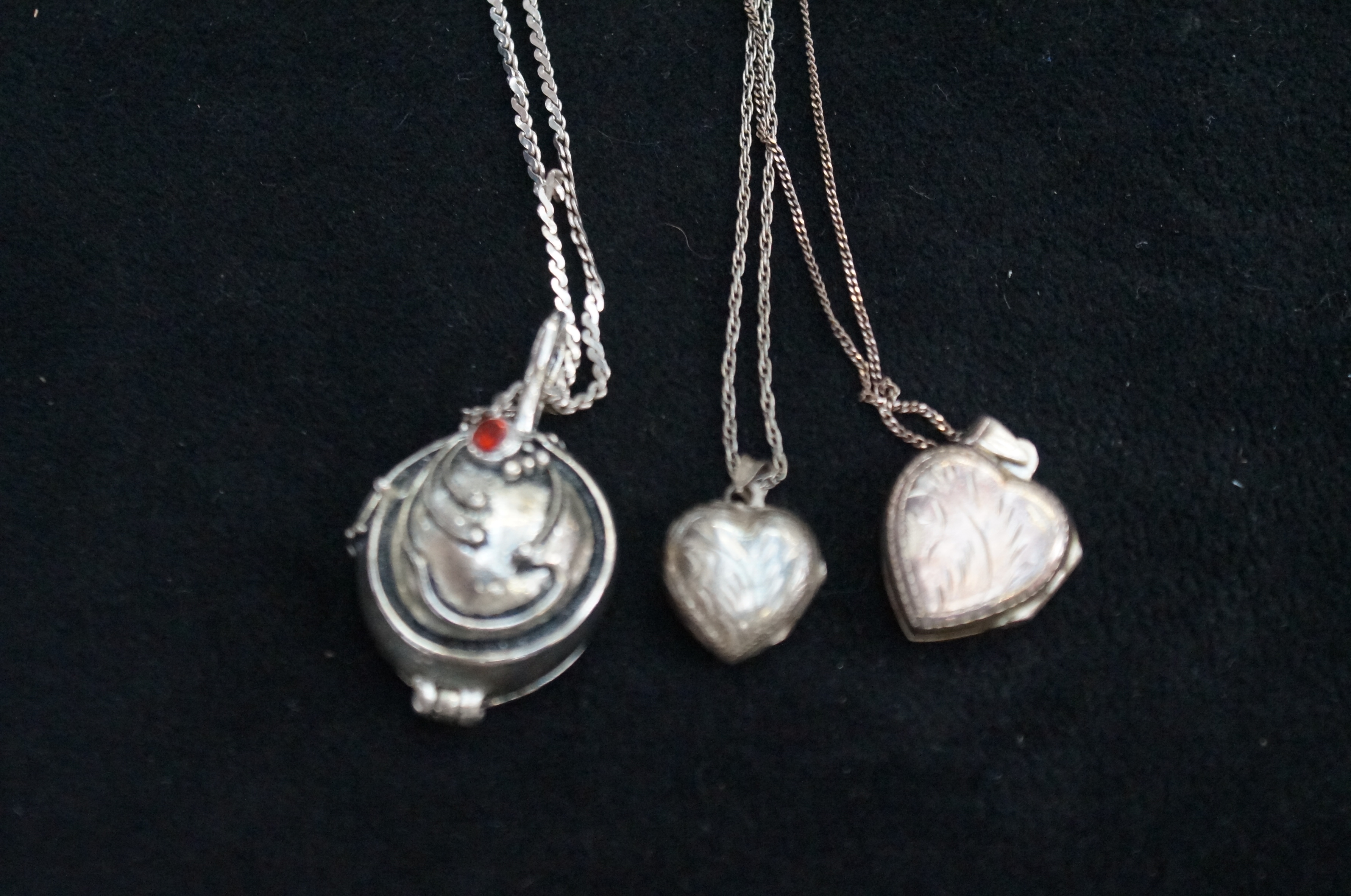 3 Silver chains with locket pendant