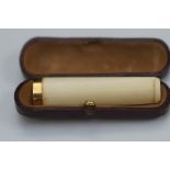 Cased cheroot holder with 9ct gold rim