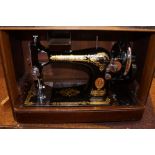 Cased singer sewing machine