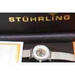 Stuhrling ladies skeleton wristwatch with box & pa