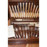 Oak cased canteen of cutlery, Roland & Co