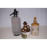 Early Soda siphon together with 2 whiskey bottles
