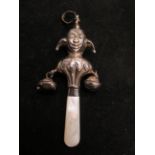 Baby's silver rattle in the form of a jester, with