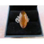 Genuine amber dress ring set in silver with coa