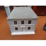 Dolls house fitted with some furniture 74 x 69 cm