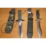 Military style knife together with a hunting knife