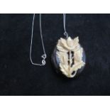 Bakelite & bone pendant on silver chain