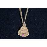 9ct Gold chain together with a 10ct gold pendant T