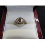 9ct Gold red stone ring possibly garnet Size O