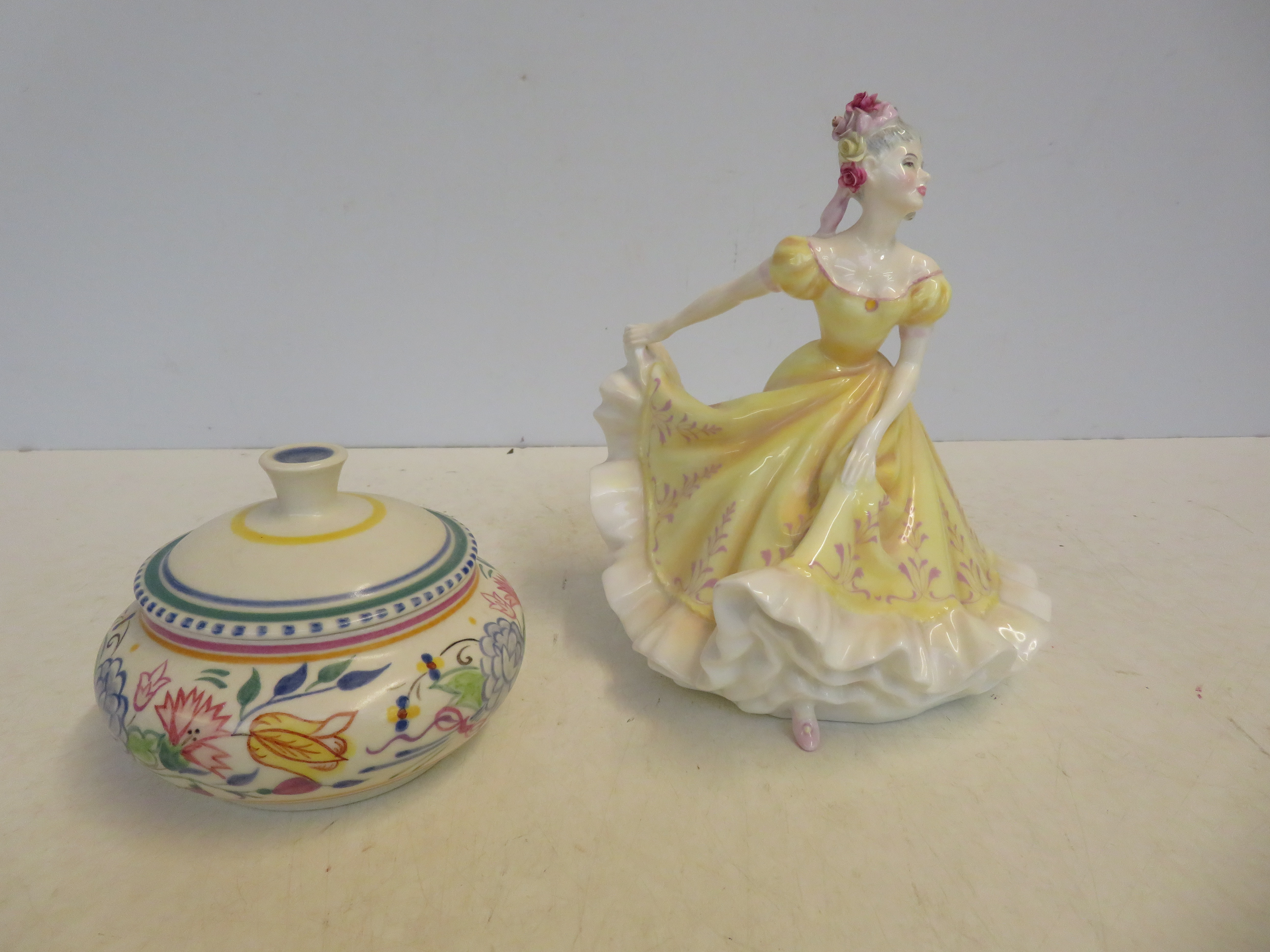 Poole lidded pot together with a Royal Doulton Nin