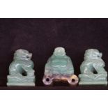 Pair of hard stone fu dogs together with a Buddha