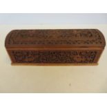 Carved oriental lidded box Length 27 cm