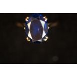 9ct Gold ring set with large blue stone