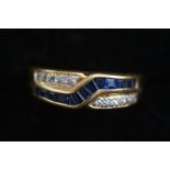 14ct Gold ring set with 10 diamonds & 15 sapphires