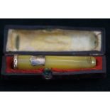 Cheroot holder with yellow metal rim & shield