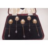Cased set of silver bean spoons