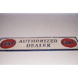 Cast iron gulf dealer sign