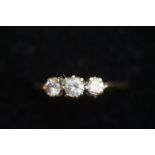 9ct Gold dress ring set with 3 white stones