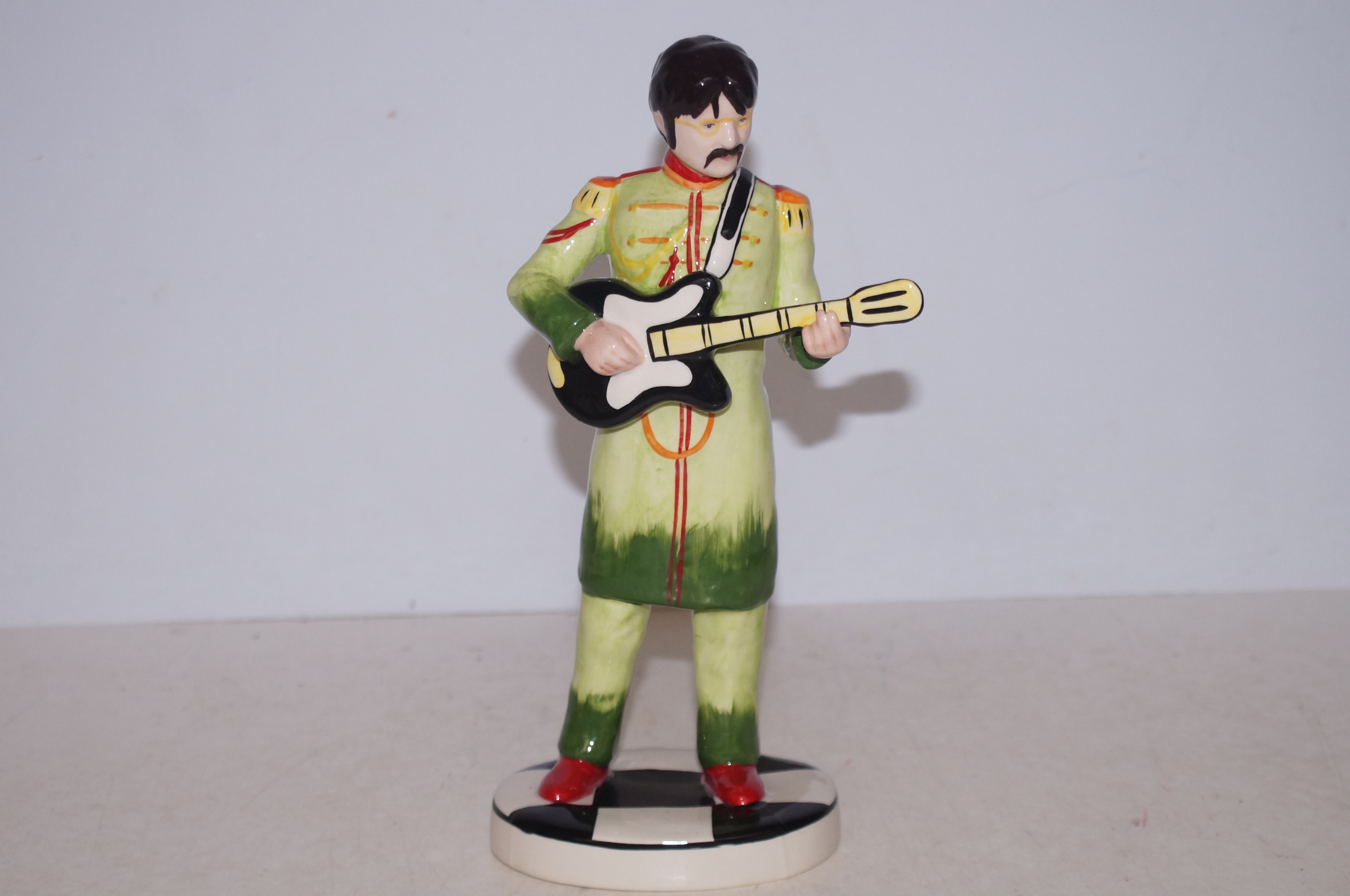 Lorna Bailey USA ringo star figure, restoration to