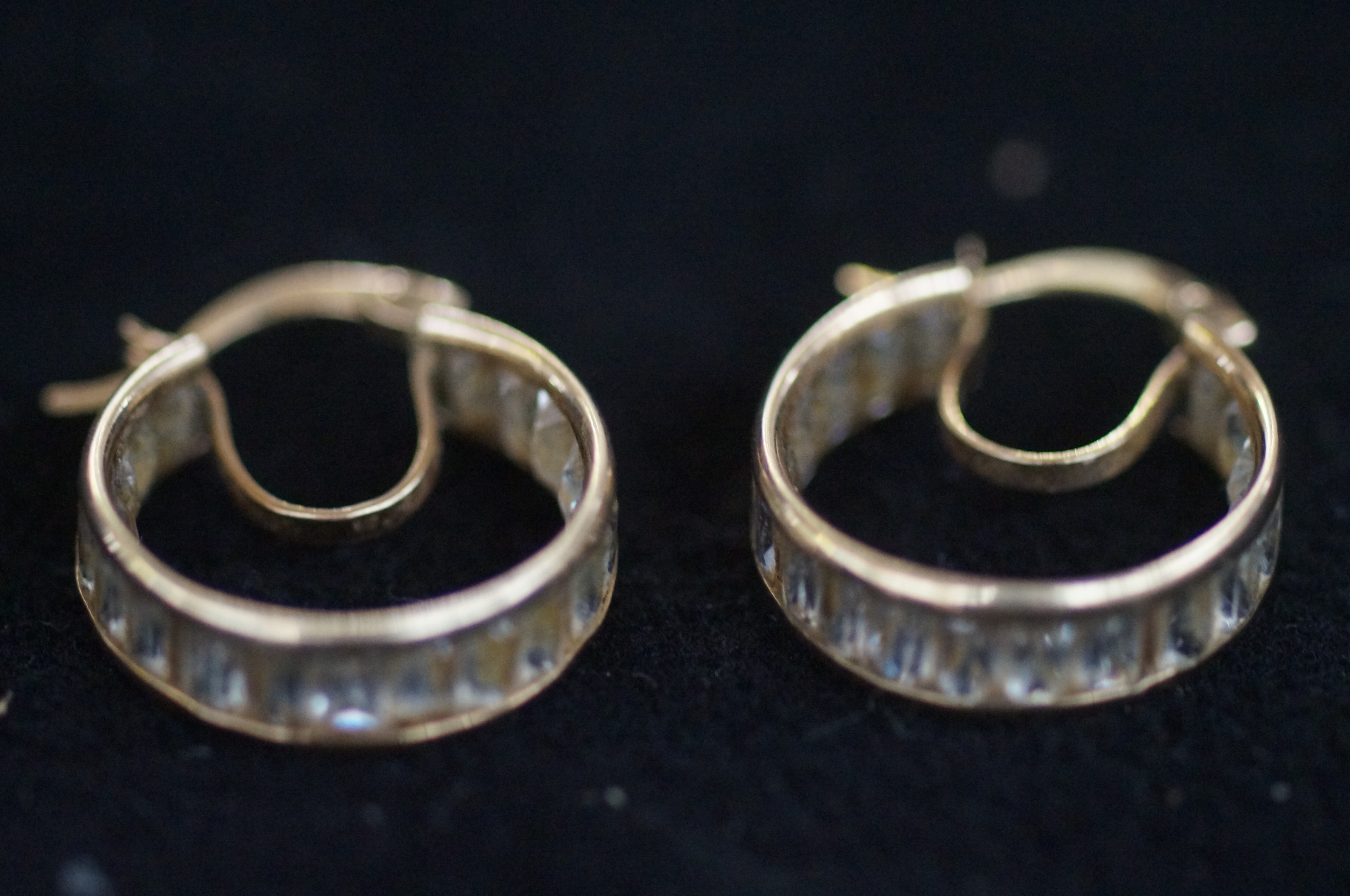 Pair of 9ct Gold earrings set with white stones