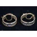 Pair of 9ct Gold earrings set with white stones