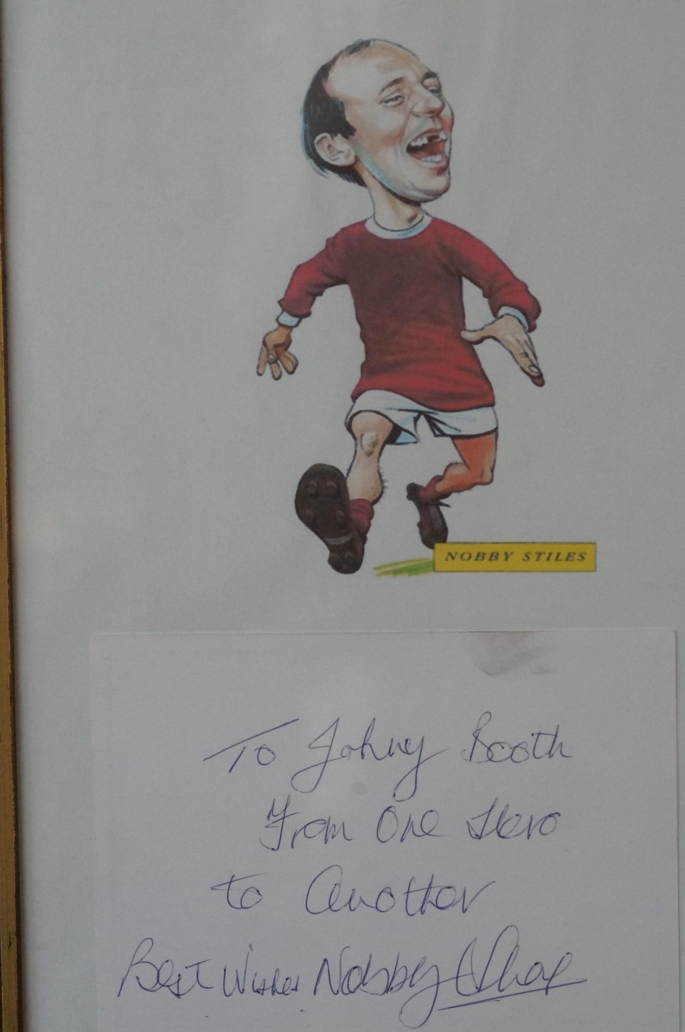 Framed autograph of nobby stiles