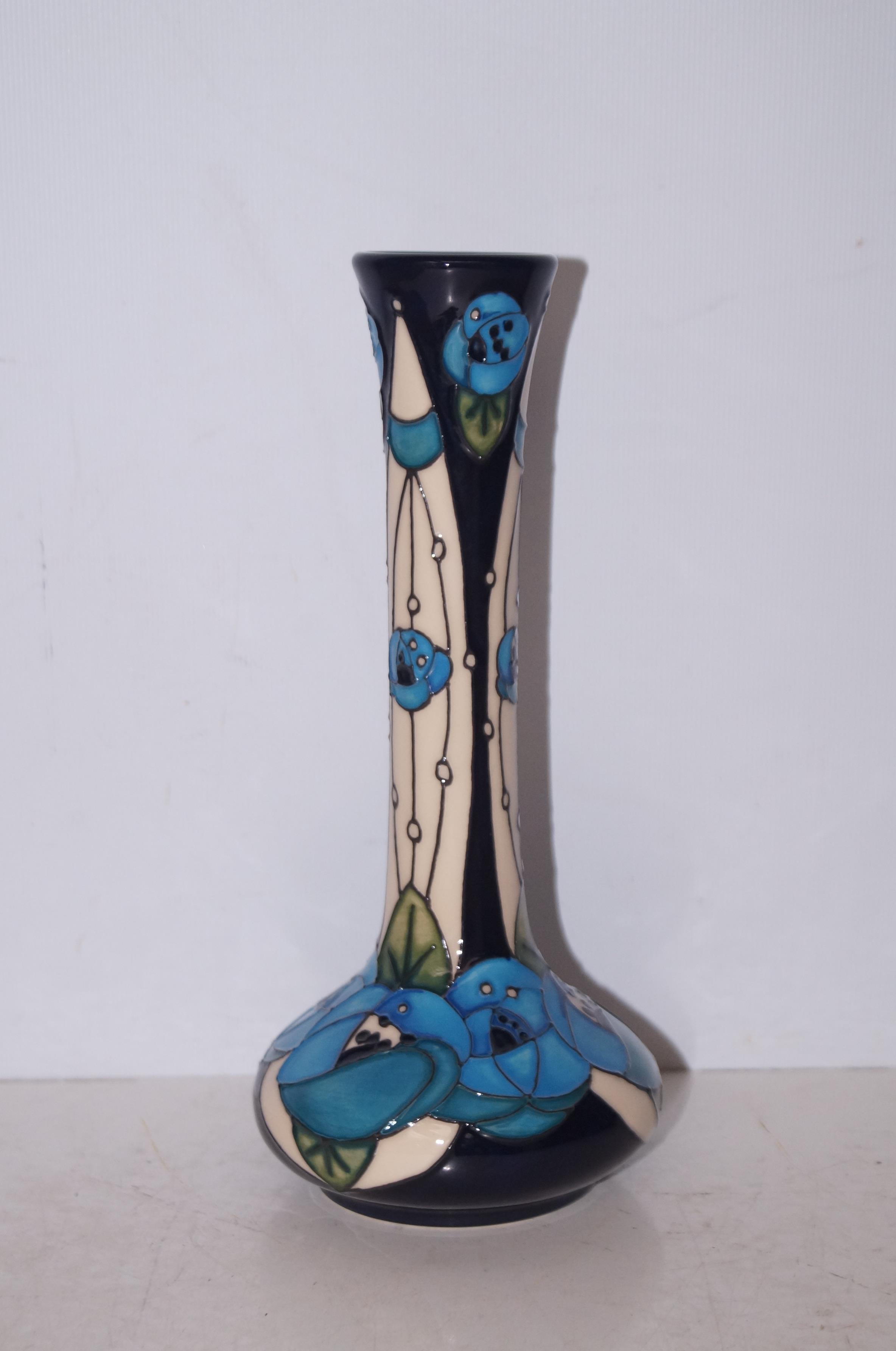 Moorcroft red rose blue vase