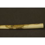 Ivory cheroot holder with tiger carving