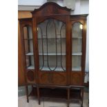 Early 20th century flame mahogany display cabinet.