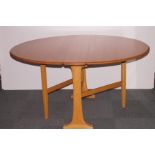 Blond Ercol drop leaf dining table 138cm diameter