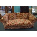 Large sofa with cushioned back and scroll arms, ra