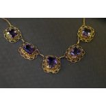 A 5 stone Amethyst necklace, each mounted individu