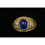 9 ct gold university ring-Cambridge with central blue stone size- M Date lower case d possibly 2003