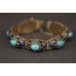 Chinese gilt silver Enamel bracelet with safety chain set with turquoise