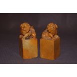 A pair of hardstone oriental Foo dogs