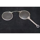 Silver lorgnette glasses