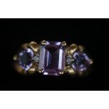 9ct Gold ring set with 3 purple stones Size N