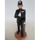 Royal Doulton police man -height 23cm