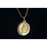 9ct Gold chain & religious pendant Weight 10.9g