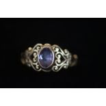 9ct Gold ring set with purple stone Size O