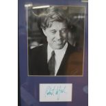 Framed photograph of Robert Redford with signed pa