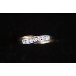 9ct Gold set with 7 diamonds Size Q