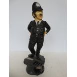 Heavy resin model of a policeman signed Peter Mook